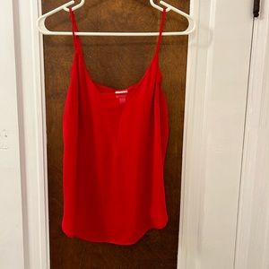 Red tank with mesh detail.
